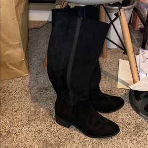 Tall black suede boots